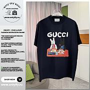 GUCCI-Inspired T-Shirt with Cartoon Dog Picnic Graphic - 1