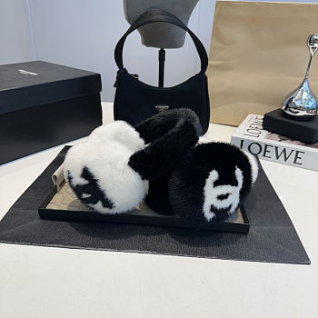 Chanel 2025 Shearling Lambskin Earmuffs – Black & White | Women’s Luxury Winter Accessory